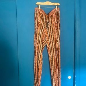 DKNY, linen material pants. Colors are a mixtures of orange and browns